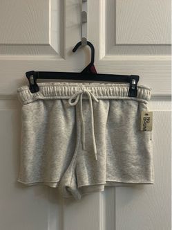 Brand new light grey & black fleece fold over shorts sizes S & XL Juniors $5.00 each
