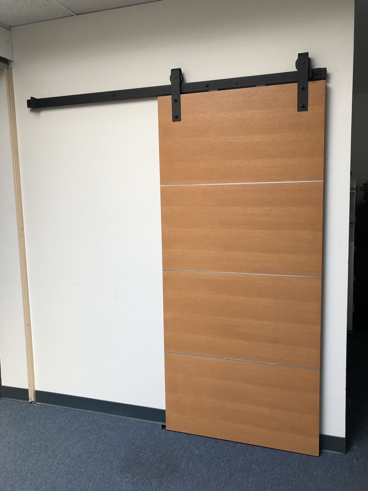 Sliding door with sliding track and hangers