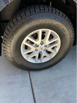 16 inch wheels and new tires 265/70/17 from 2016 Nissan Frontier
