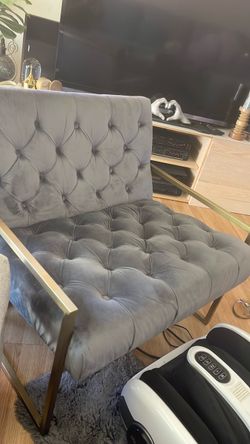 Light gray velvet accent chair with gold metal