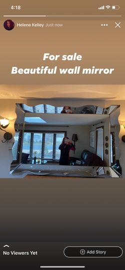 Vintage Mirror w/ flowers/vine etched on border (39” long X 57” wide)