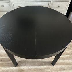 IKEA Bjursta Extendable Round to Oval Dining Table