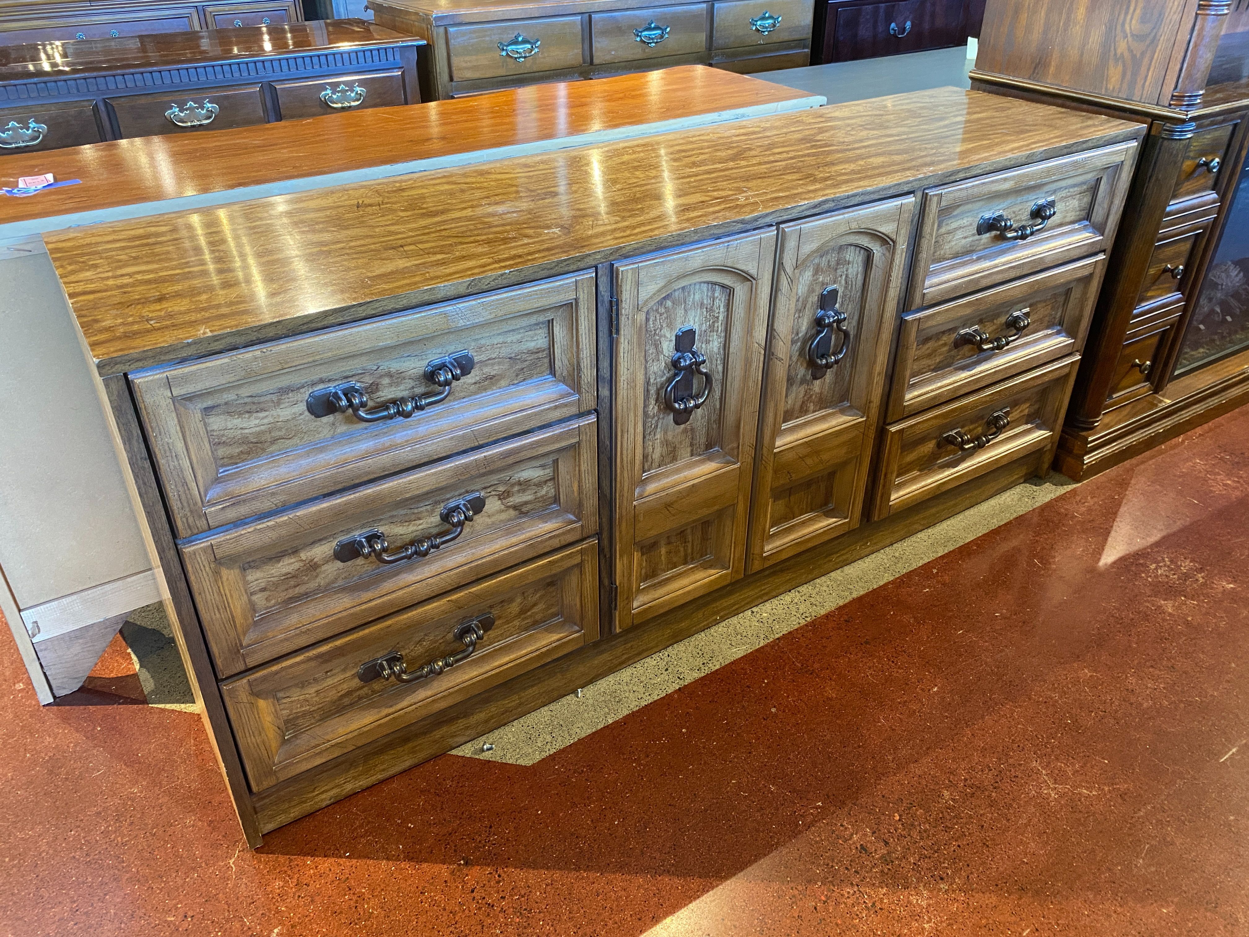 FIRST FAMILY FROM THE INDOOR WORLD OF ARMSTRONG Six Drawer and Two Door Buffet