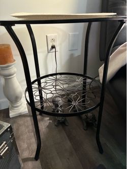 Round glass table top with black metal frame