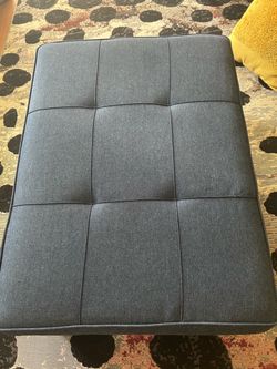Folding ottoman sofa bed.