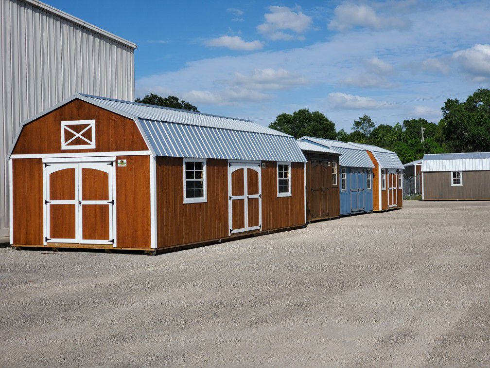 Quality storage Sheds. 14x30 lofted barn shed with 2 doors and 2 windows.