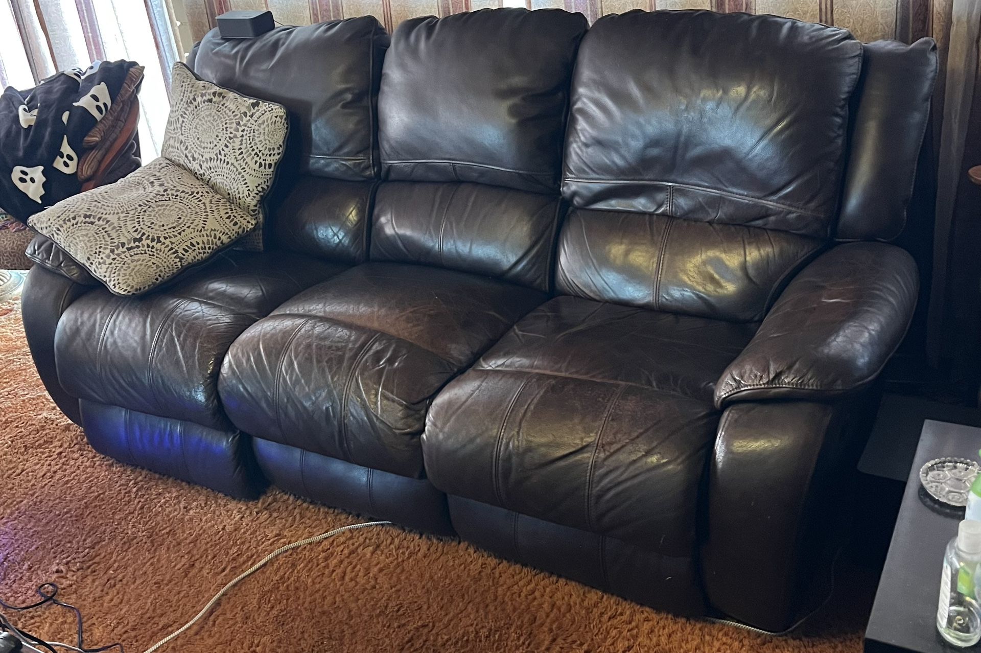 Very Used Leather Couch 