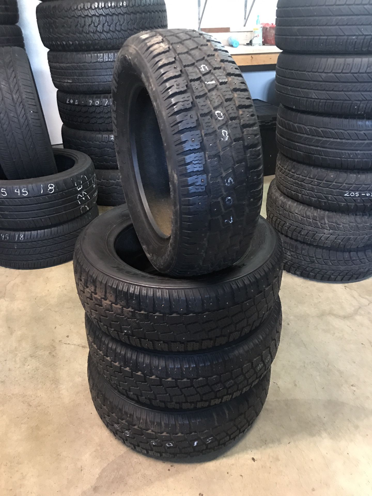 205/60/15. Set of 4 studded tires 80% tread