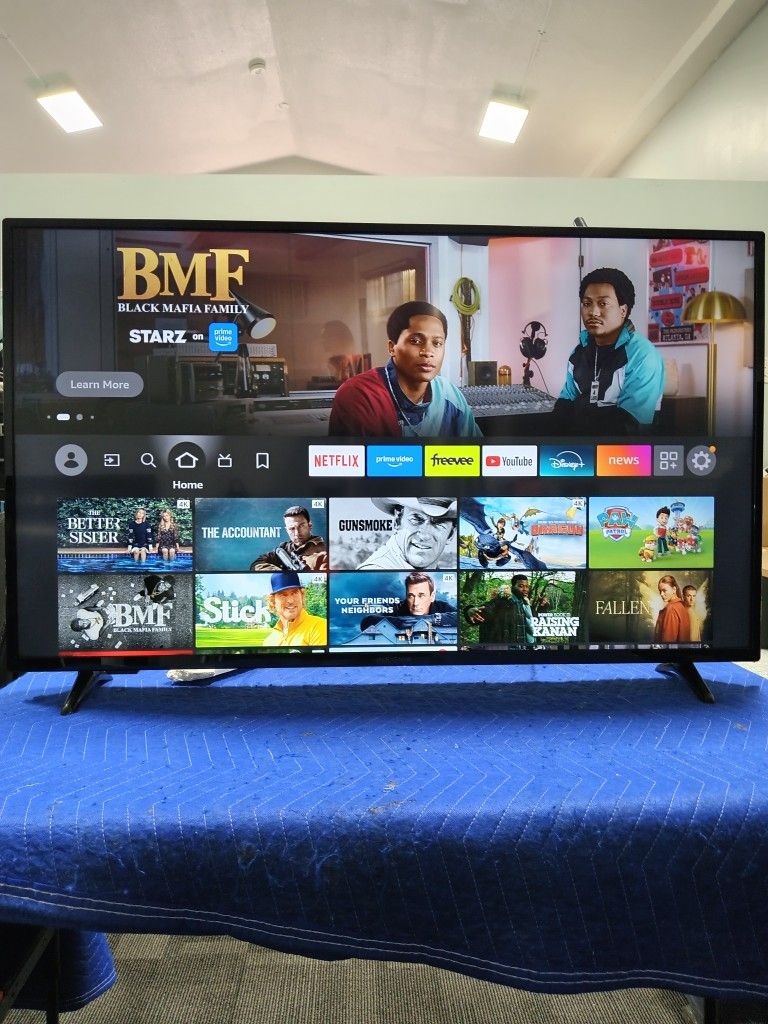 50 inch fire tv 4k smart tv beautiful tv comes with remote control shows great picture works perfect guaranteed