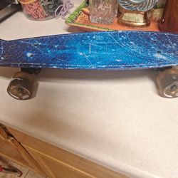 22 Inches "SKITCH"  SKATEBOARD MINI CRUISER BOARD BLUE GALAXY  $40. FIRM PRICE 