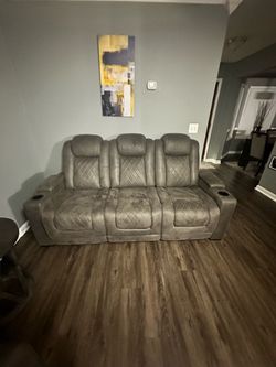 Gray  Power Reclining Sofa and Loveseat with Console