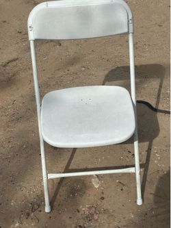 White folding tables and chairs