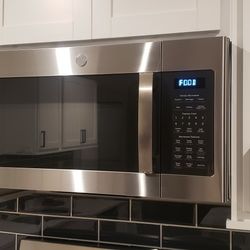 GE® 1.9 Cu. Ft. Over-the-Range Sensor Microwave Oven with Recirculating Venting