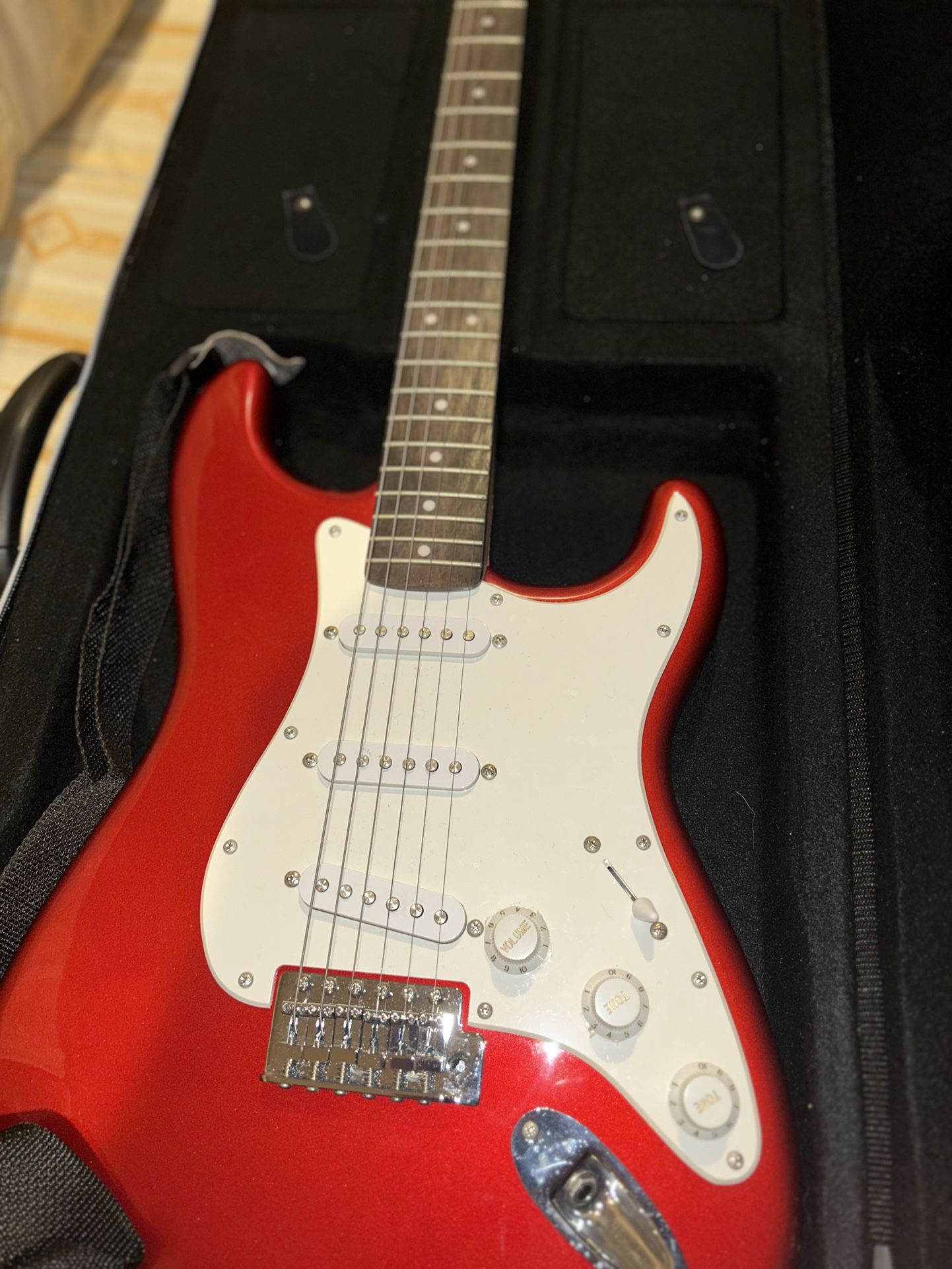 Squier by Fender Stratocaster Electric Guitar – Candy Apple Red + Gig Bag + Fender 15w Amp