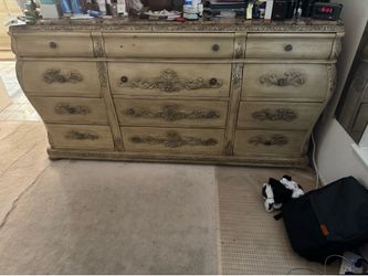 2 wooden nightstands and dresser with mirror attachment