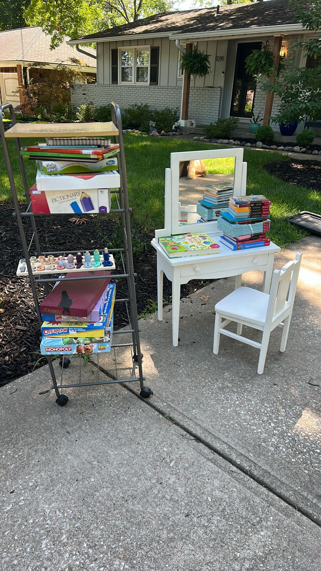 Bob Stroller $10, All Our Favorite Books $15, Table Desk $20