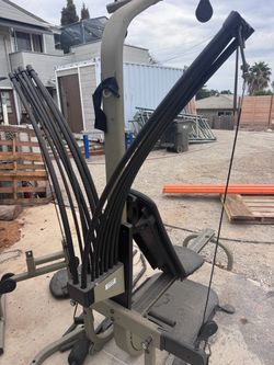 Free bow flex machine.   With attachments