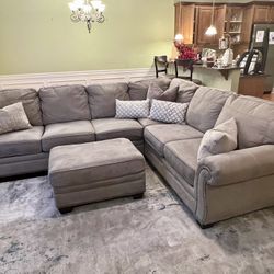 Sectional + Ottoman + Large Rug