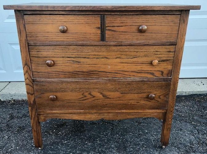 Antique solid wood 3 drawer dresser w/casters by Helmers Furniture. Drawers dovetail, divided top drawer some marks on the top, 36"W x 18"D x 34 1/2"H