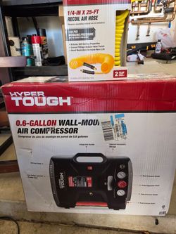 Hyper Tough Air compressor wall mounted.