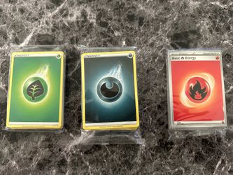 3 Unopened Pokemon Energy Packs.