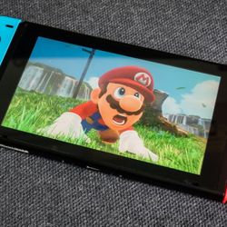 Nintendo Switch W/red & blue Joycon