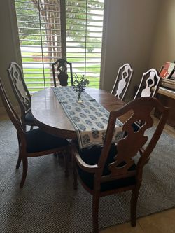 44" Pecan Table With 2 Leaves, 6 chairs.