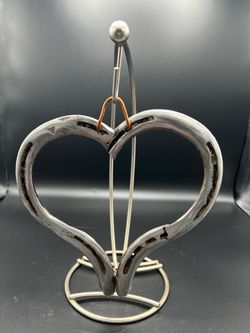 Handcrafted horseshoe heart with Metal stand.