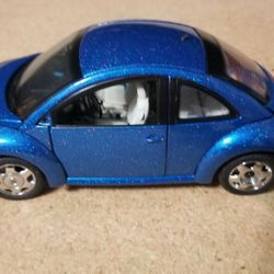 2000 Vw Millennium Edition Blue in 1:24 scale by The Franklin Min

Toy