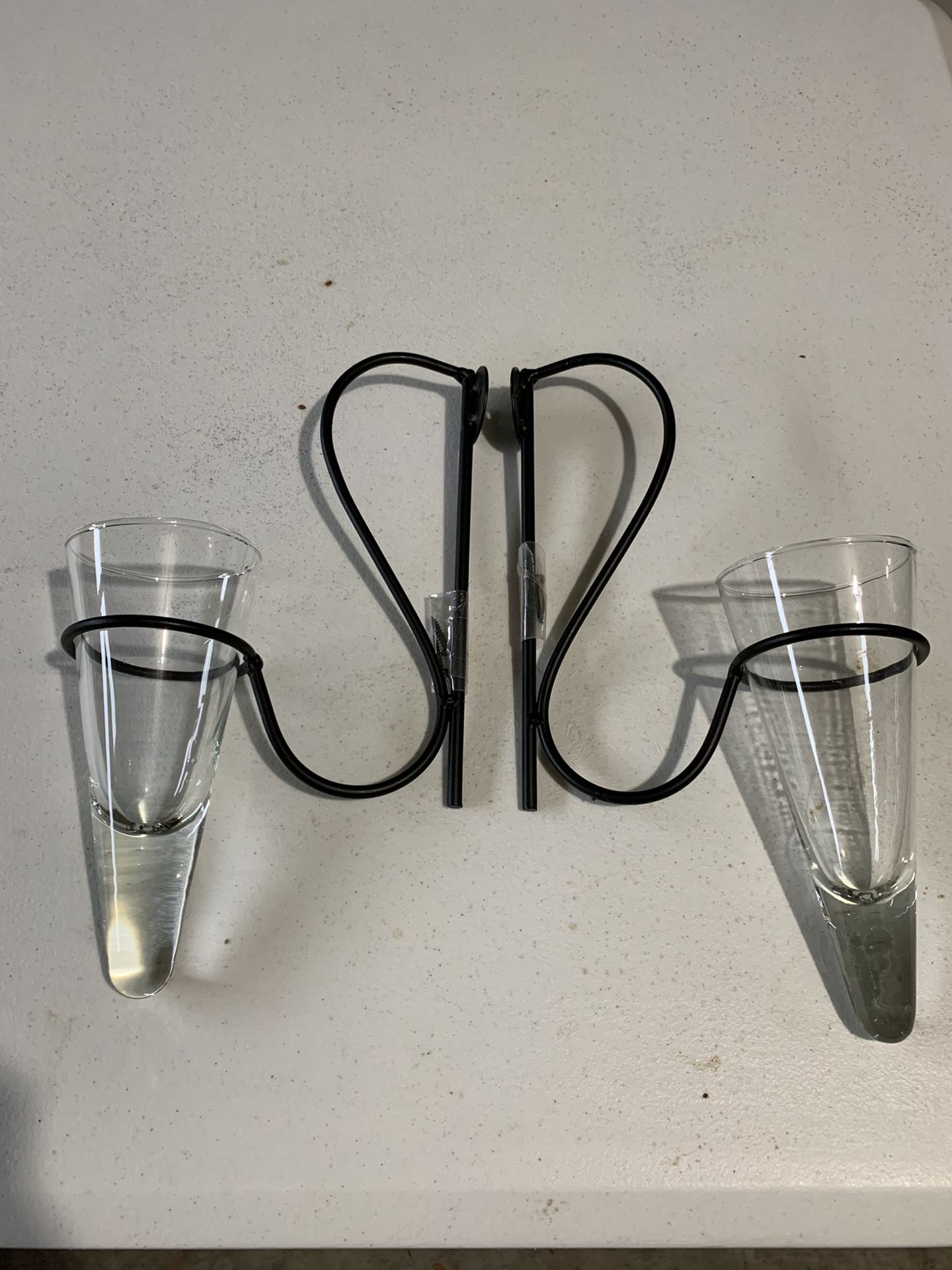 Black iron and glass vases