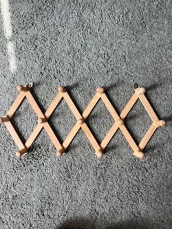 Wooden wall pegs