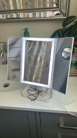 Mirror with light