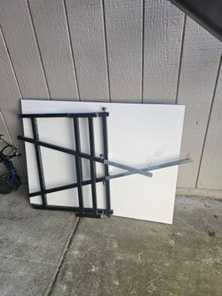 Folding,adjustable laminate table/desk