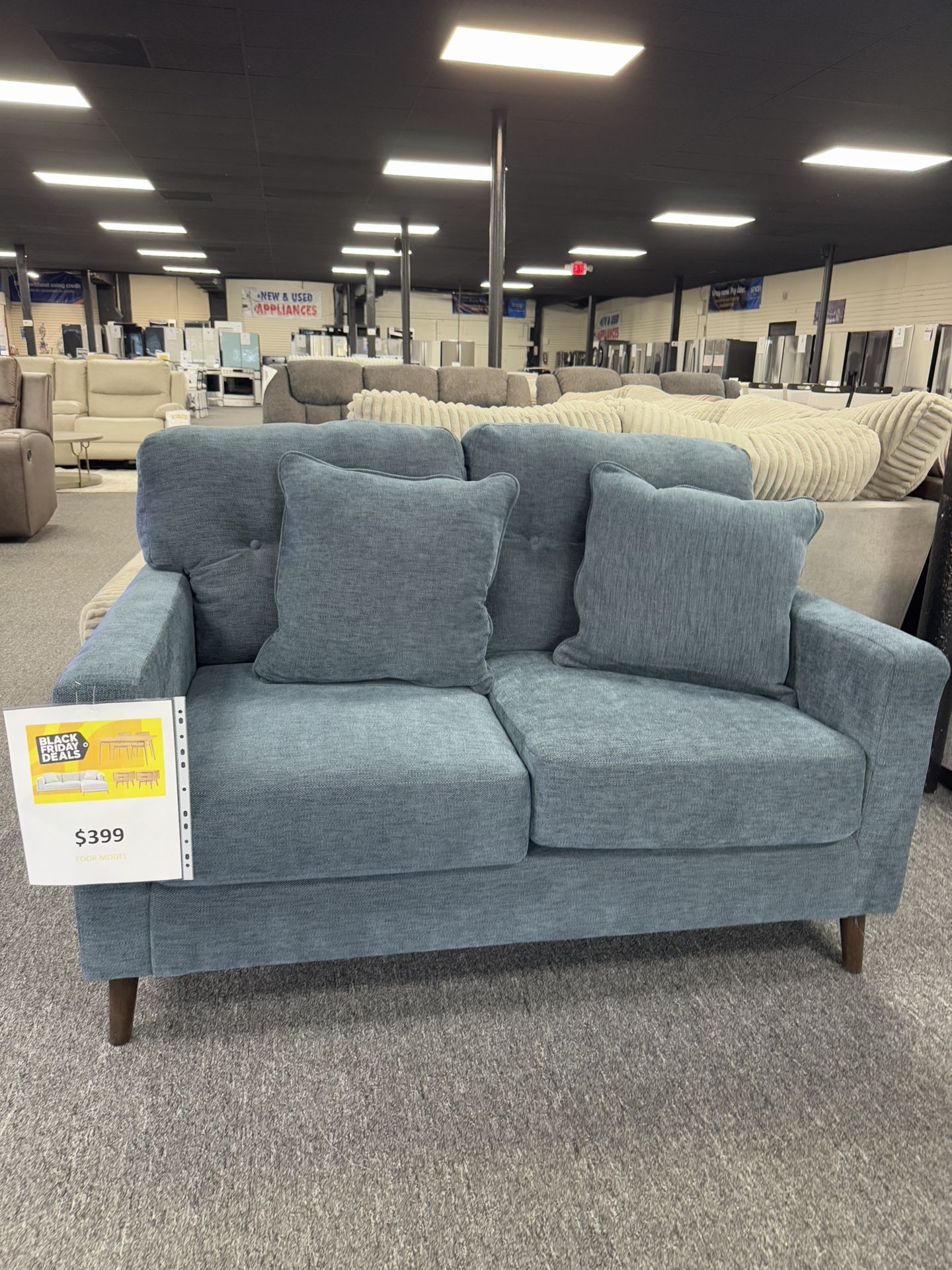 Loveseat By Ashley. 🚚WE DELIVER🚚