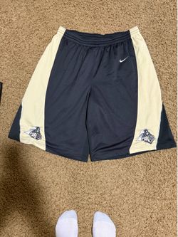 Used college basketball shorts sizes 2XL with draw string. Have 12 pairs and pics and logos of the teams are in the pics.
