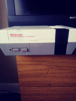 Nintendo....comes with mario game...duck hunt gun included an one controller