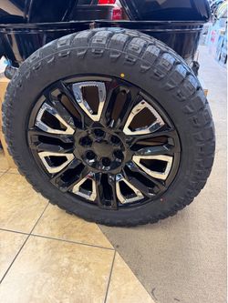 22” wheels with all terrain tires Denali style