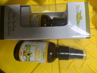 The bottle displays a 30 ml glass container labeled as 100% Pure Virgin Marula Oil.