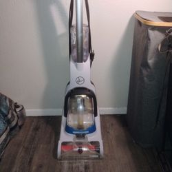 This is a Hoover PowerDash Pet Compact Carpet Cleaner