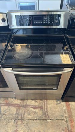 LG Glass top Stove/Oven Stainless Steel With Slide in
