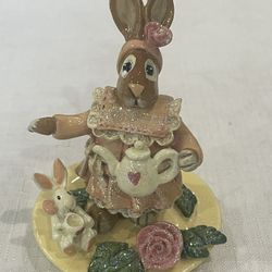 1998 ceramic figurine by Donna Little featuring two rabbits having tea.