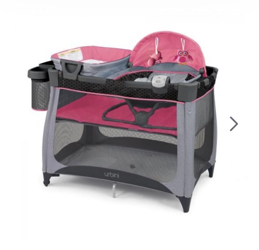 Urbini 4 in 1 play yard with bonus sleeper Bassinet
