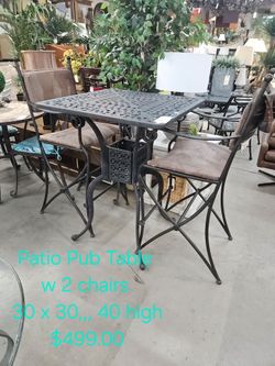Cast Iron Patio Pub Table with 2 Chairs We are located at 2811 East Bell road. Another Time Around Furniture.
