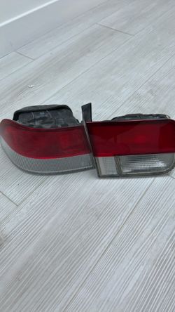 99 Honda civic tail lights. May fit other years