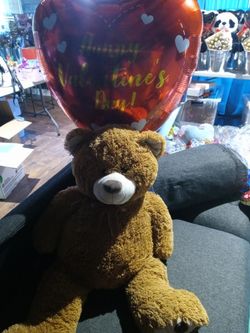 Large Bear With Huge Balloon