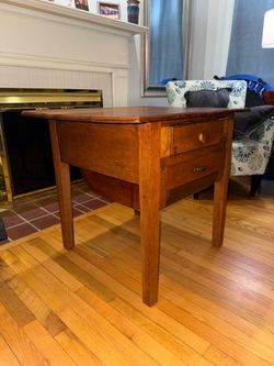 Antique primitive “possum belly” table