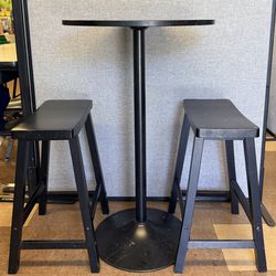 Cocktail table with two stools