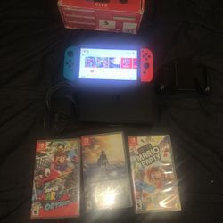 Nintendo Switch Oled ( 4 Games Included)