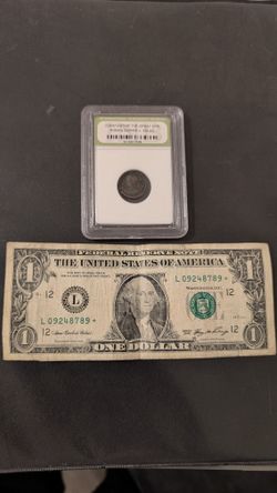 Roman Empire Coin And 1 U.S. Currency Dollar Star note