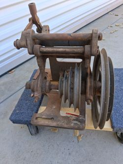 Antique pullys on adjustable jackshaft.